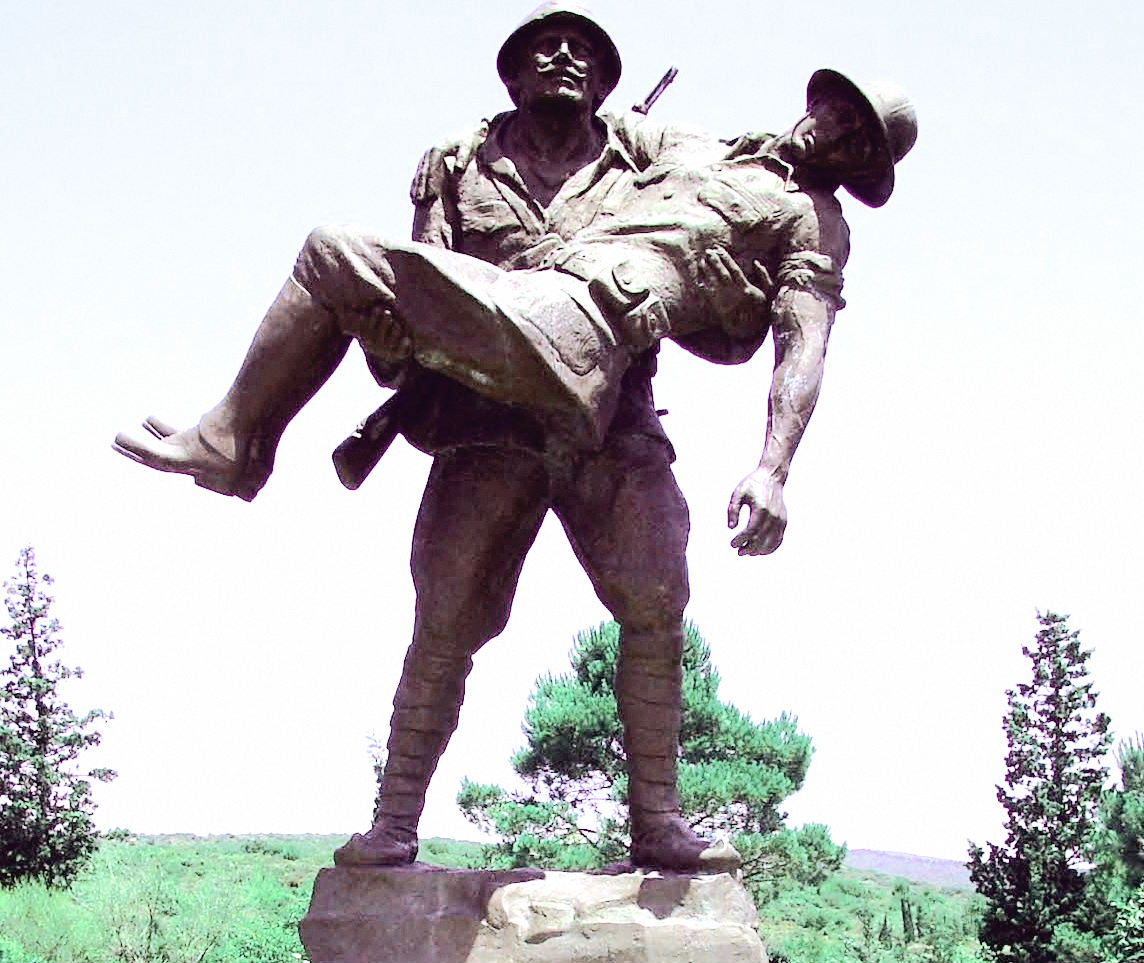 Turkish soldier carrying wounded Australian soldier